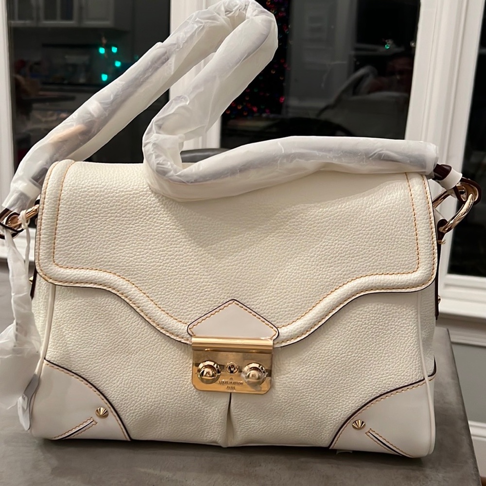 Louis Vuitton portef eugenie monogram bag